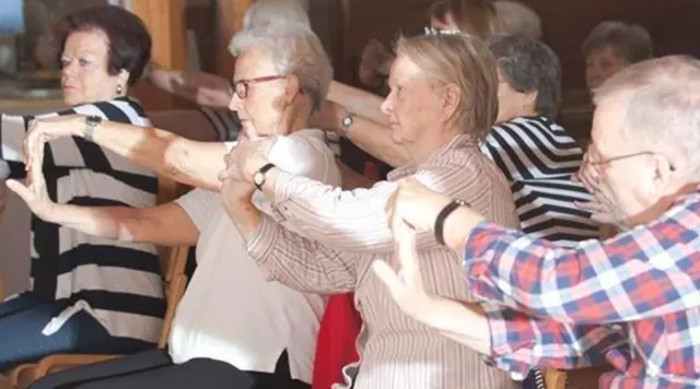 Chair exercise for seniors at the Iso Omena Library